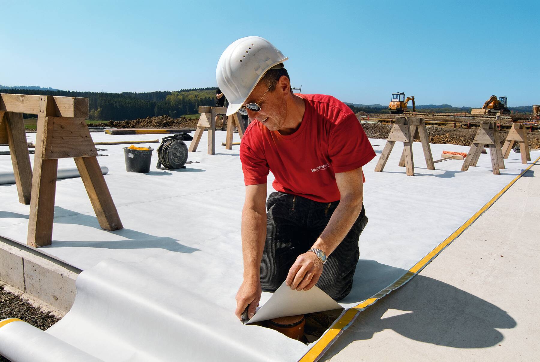 WeberHaus Monteur auf der Baustelle WeberHaus Monteur auf der Baustelle